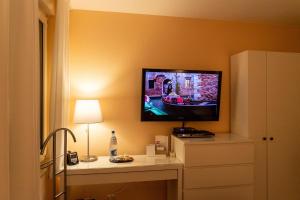 TV a/nebo společenská místnost v ubytování BIT-City Studio und Appartement