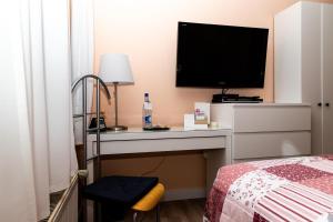 Postel nebo postele na pokoji v ubytování BIT-City Studio und Appartement
