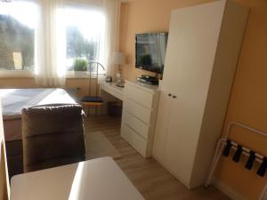 Kuchyň nebo kuchyňský kout v ubytování BIT-City Studio und Appartement
