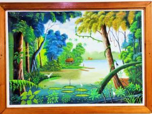 a painting of a forest with water lilies at Mini Departamento Iquitos 1245-01 in Iquitos
