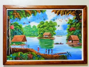 uma pintura de um rio com pessoas e casas em Mini Departamento Iquitos 1245-01 em Iquitos