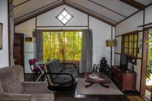 พื้นที่นั่งเล่นของ Woodland Gardens Pet Friendly Lodge