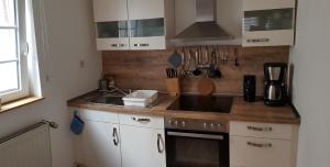 Kuchyň nebo kuchyňský kout v ubytování Ferienwohnung Collato - Boppard Zentrum am Marktplatz