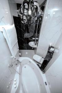 Ванная комната в Słowackiego Apartments