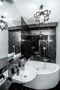Phòng tắm tại Słowackiego Apartments