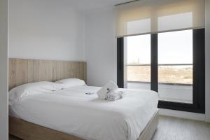 En eller flere senge i et værelse på Villa Alimar - Basque Stay