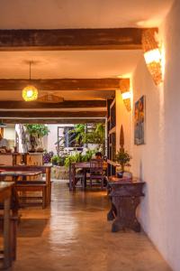 En restaurant eller et andet spisested på Anacã Pousada