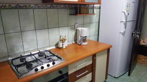 Venus Plaza Apartment Ploiesti tesisinde mutfak veya mini mutfak