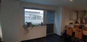 Kuchyň nebo kuchyňský kout v ubytování Appartement Duplex à l'entrée de Ciney Avec emplacement vélos