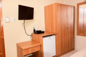 Kuchyň nebo kuchyňský kout v ubytování Hotel Pousada Bonita - 150m Metrô Paraiso e 1Km do inicio Av Paulista