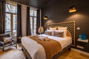 מיטה או מיטות בחדר ב-Sweet Inn - Turenne