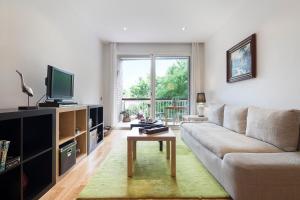 TV a/nebo společenská místnost v ubytování Key Gracia Apartments