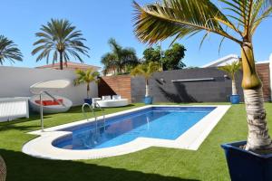 Bazén v ubytovaní Olivia Holidayhouse Maspalomas alebo v jeho blízkosti