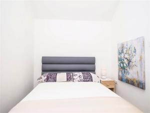 Posteľ alebo postele v izbe v ubytovaní Apartment Sensa