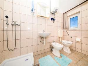 Kúpeľňa v ubytovaní Apartment Sensa + 6 fotografií