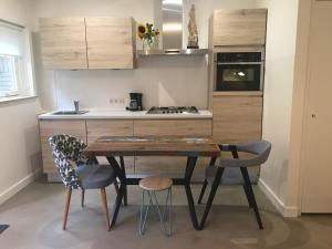 Fotografie z fotogalerie ubytování Natuurpark Hoefbos Boshuisje Veluwe v destinaci Otterlo