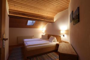 Llit o llits en una habitació de Kasperbauer