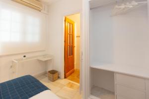 Letto o letti in una camera di BOHEMIA SANLUCAR