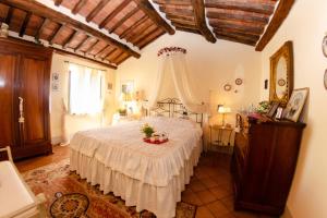 A bed or beds in a room at La Casa del Sole