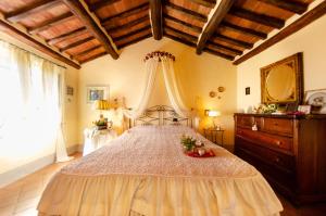 A bed or beds in a room at La Casa del Sole