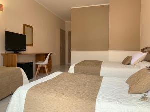 Postel nebo postele na pokoji v ubytování Hotel Restaurant Llansola