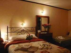 Postel nebo postele na pokoji v ubytování Villa Rosa