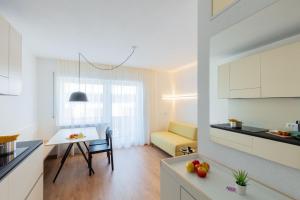 Kuchyň nebo kuchyňský kout v ubytování Hus Appartement - Nr. 2