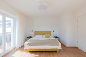 Postel nebo postele na pokoji v ubytování Hus Appartement - Nr. 2