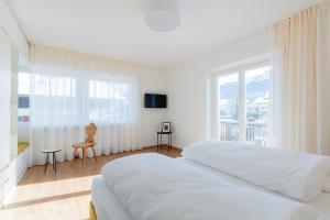 Postel nebo postele na pokoji v ubytování Hus Appartement - Nr. 2