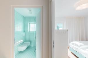Ванная комната в Hus Appartement - Nr. 3