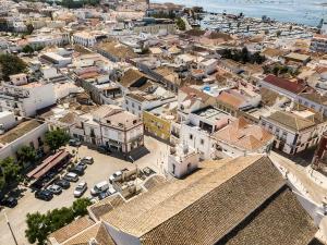 Nespecifikovaný výhled na destinaci Faro nebo výhled na město při pohledu z apartmánu