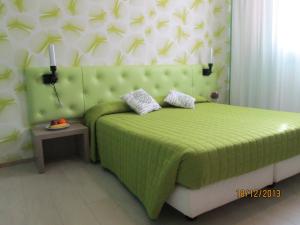 Postel nebo postele na pokoji v ubytování Hotel Tropical + 32 fotografií