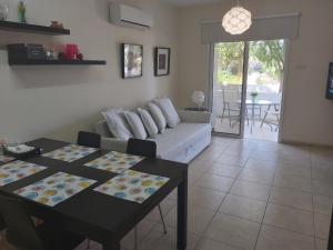 Χώρος καθιστικού στο Mythical Sands Resort Ilona Apartment for families