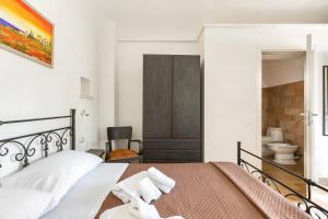 Postel nebo postele na pokoji v ubytování B&B Mariano