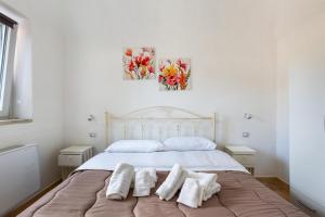 Postel nebo postele na pokoji v ubytování B&B Mariano