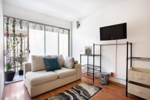 TV o dispositivi per l'intrattenimento presso Hostal Top Location ideal para viajeros Polanco