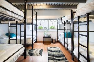 Letto o letti in una camera di Hostal Top Location ideal para viajeros Polanco