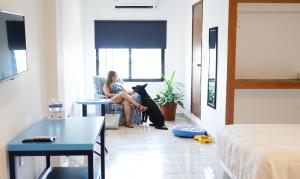 Postel nebo postele na pokoji v ubytování Hotel & Suites Arges - Centro Chetumal