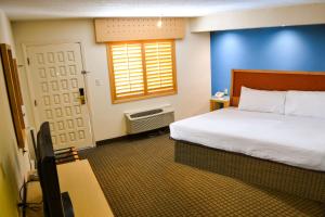 Voodi või voodid majutusasutuse Hotel Colonial Ciudad Juarez toas
