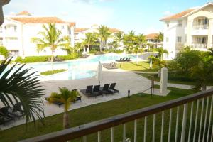 a view of a resort with a swimming pool at The blue lagoon of the Caribbean Sea. Velero 205.Cadaques Caribe in La Fragata
