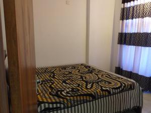 Letto o letti in una camera di Mangohut Joy