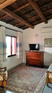 TV a/nebo společenská místnost v ubytování S'Abba Druche rooms