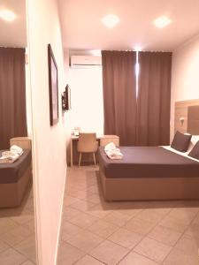 Voodi või voodid majutusasutuse Academy Hotel toas