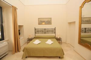 Letto o letti in una camera di Villa Lucrezio Resort
