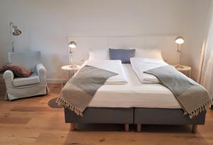 Ένα ή περισσότερα κρεβάτια σε δωμάτιο στο Domizil Gols, Studios Am Anger