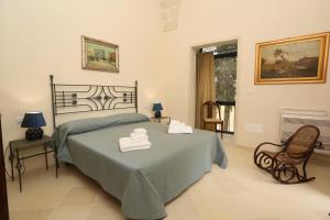 Letto o letti in una camera di Villa Lucrezio Resort