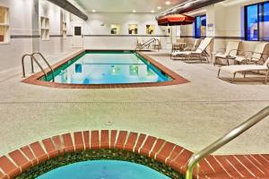 a pool in the middle of a hotel room at Holiday Inn Express Hotel & Suites Bartlesville, an IHG Hotel in Bartlesville
