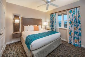 a bedroom with a large bed and a window at Holiday Inn Club Vacations Panama City Beach Resort in Panama City Beach +26 photos