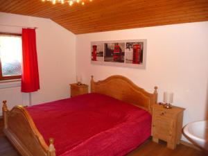 En eller flere senge i et værelse på Landhaus Alpenblick