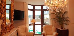 Telewizja i/lub zestaw kina domowego w obiekcie Casa Victoria garden con Jacuzzi y piscina